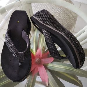 Volatile black patent croc flip flops